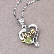 Bids.com 0.49 Carat Genuine Peridot and Black Spinel .925 Sterling Silver Pendant Pendants