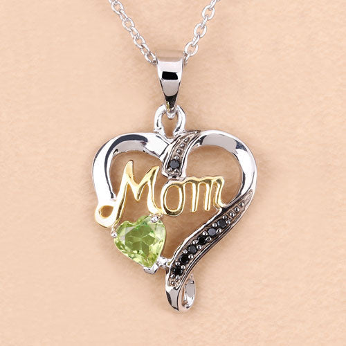 Bids.com 0.49 Carat Genuine Peridot and Black Spinel .925 Sterling Silver Pendant Pendants