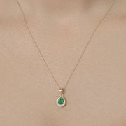 Bids.com 0.89 Carat Genuine Zambian Emerald and White Diamond 14K Yellow Gold Pendant Pendants