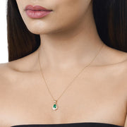 Bids.com 0.89 Carat Genuine Zambian Emerald and White Diamond 14K Yellow Gold Pendant Pendants