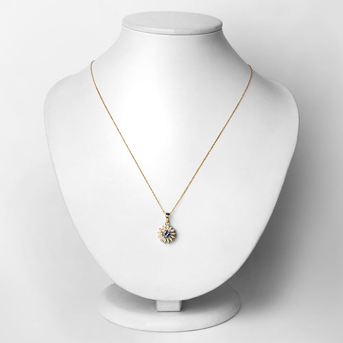 Bids.com 0.31 Carat Genuine Tanzanite and White Diamond 14K Yellow Gold Pendant Pendants