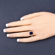 Bids.com 3.07 Carat Glass Filled Sapphire and White Zircon .925 Sterling Silver Ring Rings