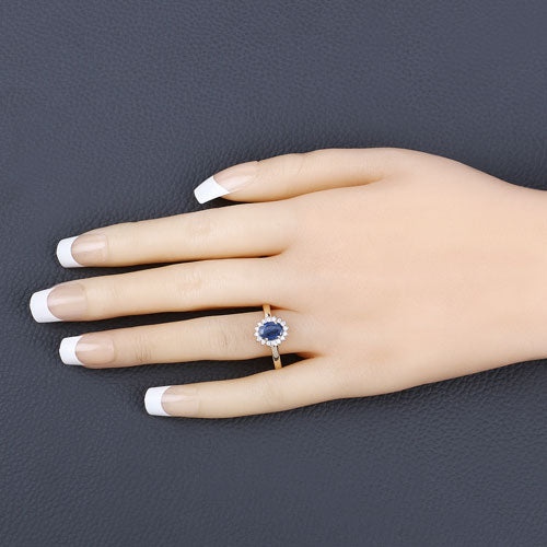 Bids.com 1.11 Carat Genuine Blue Sapphire and White Diamond 10K Yellow Gold Ring Rings